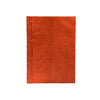 Dark orange notebook on a white background