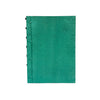 Green textured notebook with black rings on a white background