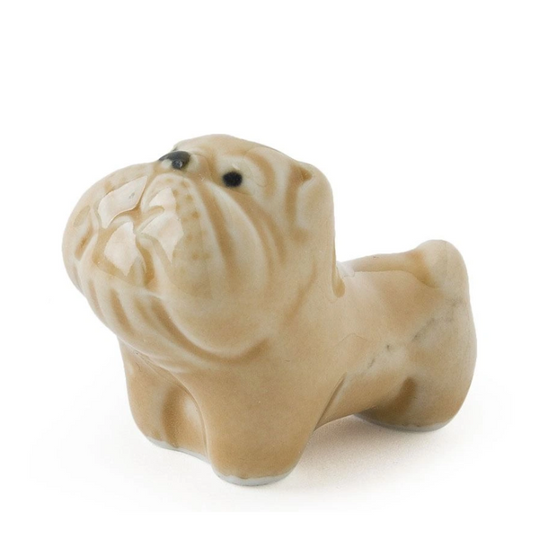 Cute brown bulldog as ceramic chopstick rest