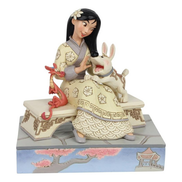 Statue of a woman with a dog and a dragon on a decorative base